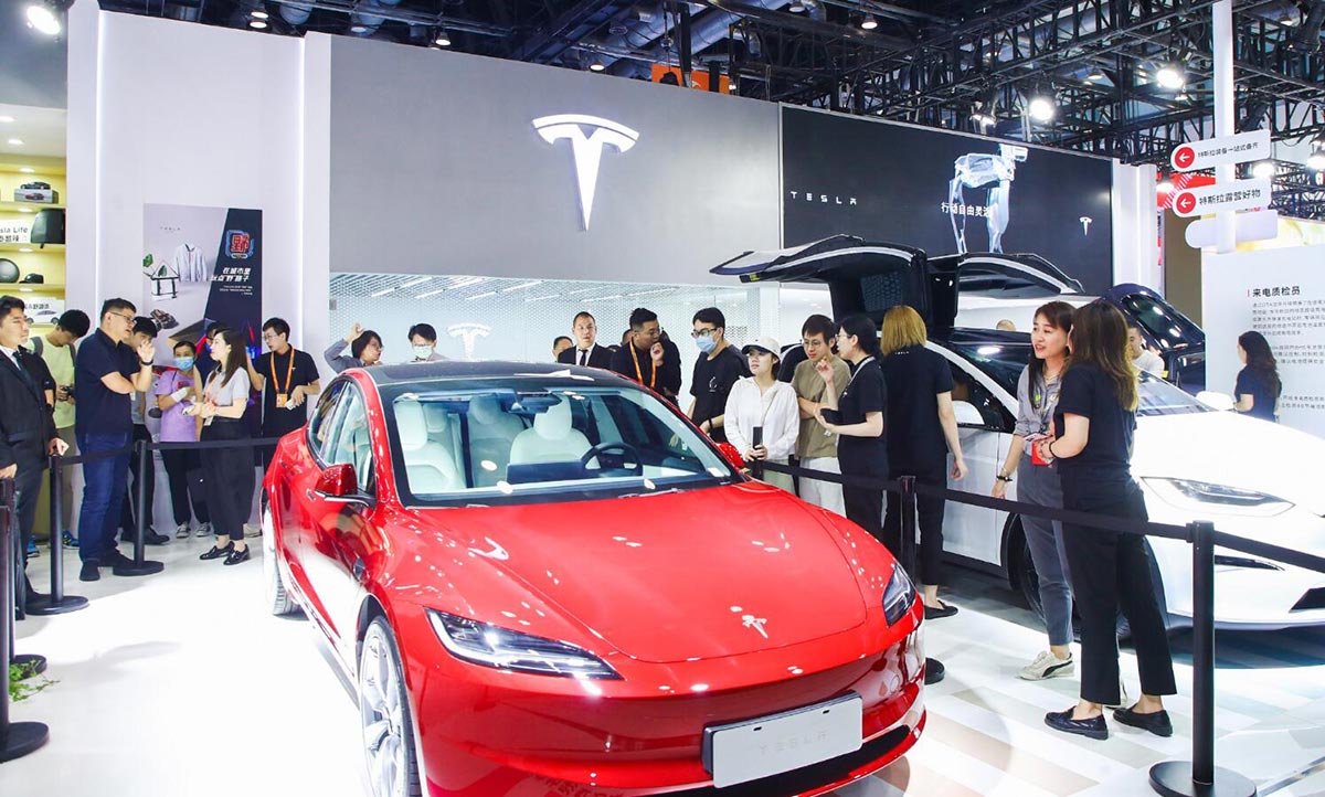 Tesla's revamped Model 3 makes real-life China debut at Beijing trade ...